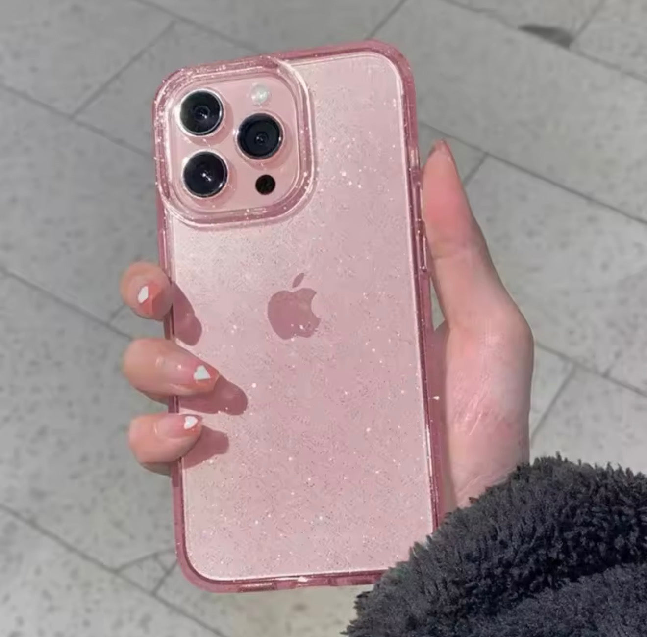 Coque souple transparente à paillettes roses